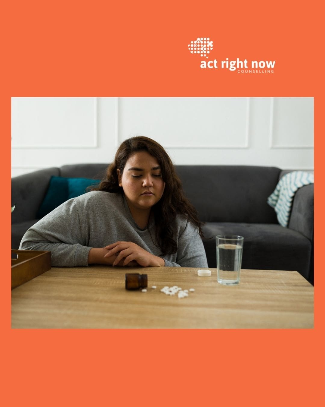 A woman sitting on a couch with a glass of water and spilled medication tablets on the table, looking distressed, symbolising depression and mental health struggles. Act Right Now Counselling logo above.